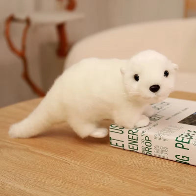 doudou loutre blanc