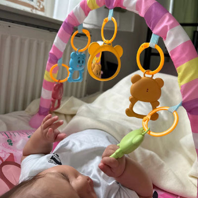 Tapis d'éveil jouets