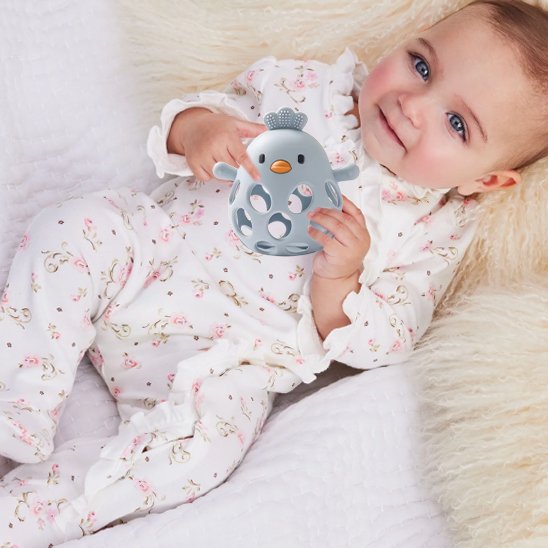 Anneau de dentition bébé content  poussin  bleu