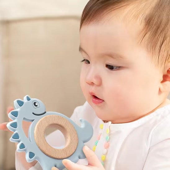 Anneau dentition bébé dinosaure bleu