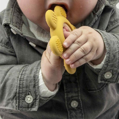 bébé mache anneau de dentition jaune