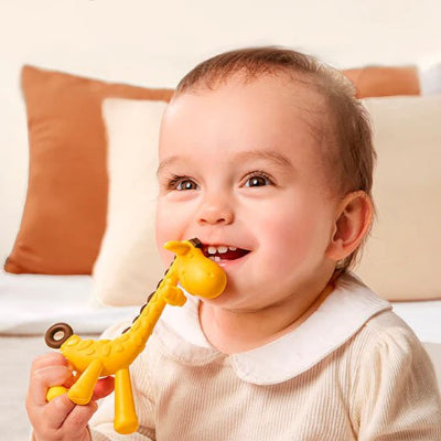 bebe manipule anneau de dentition girafe jaune