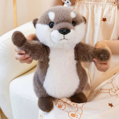 doudou loutre accueillante