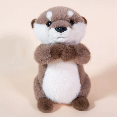 doudou loutre mignonne assise