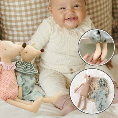 doudou souris bebe content