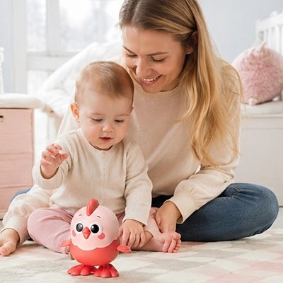 Jouet bebe beau poussin rose