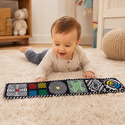 Livre bebe en tissus sur tapis